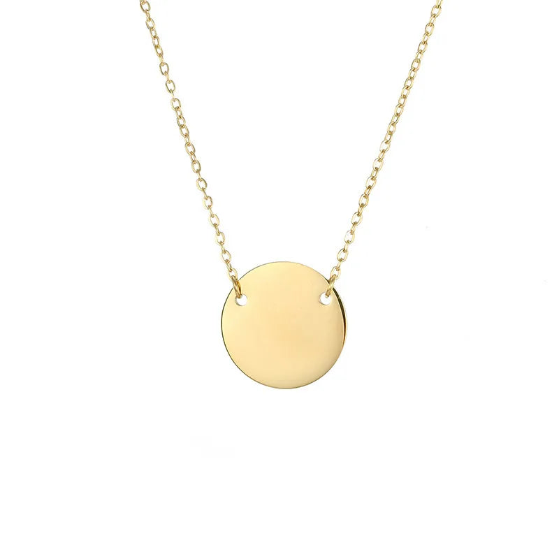 Collier couleur or en acier inoxydable avec médaille ronde minimaliste.