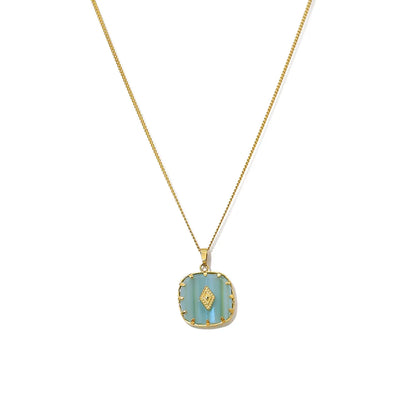 Collier couleur or en acier inoxydable avec pendentif turquoise serti, style bohème chic.