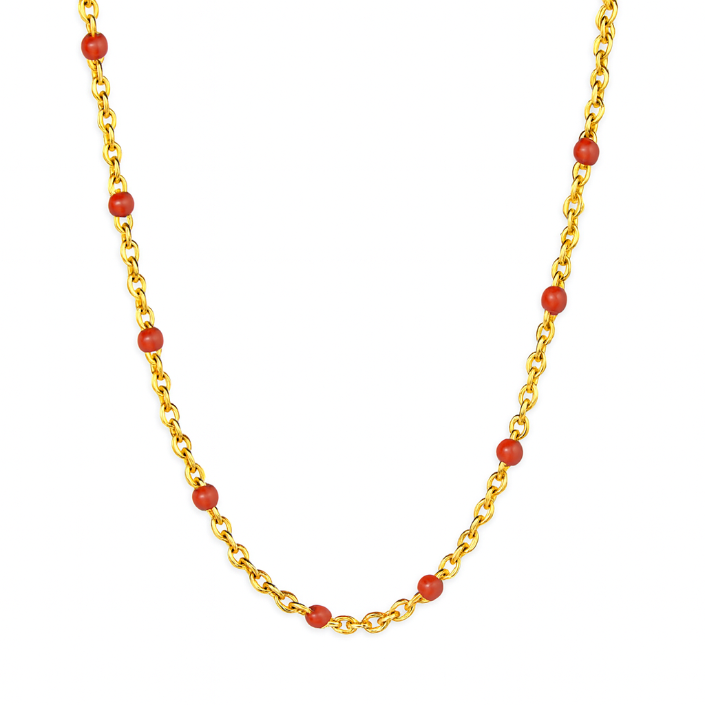 collier doré en acier inoxydable, orné de petites perles rouges réparties régulièrement. Un bijou à l’allure solaire, parfait pour un style méditerranéen, bohème ou ethnique chic.