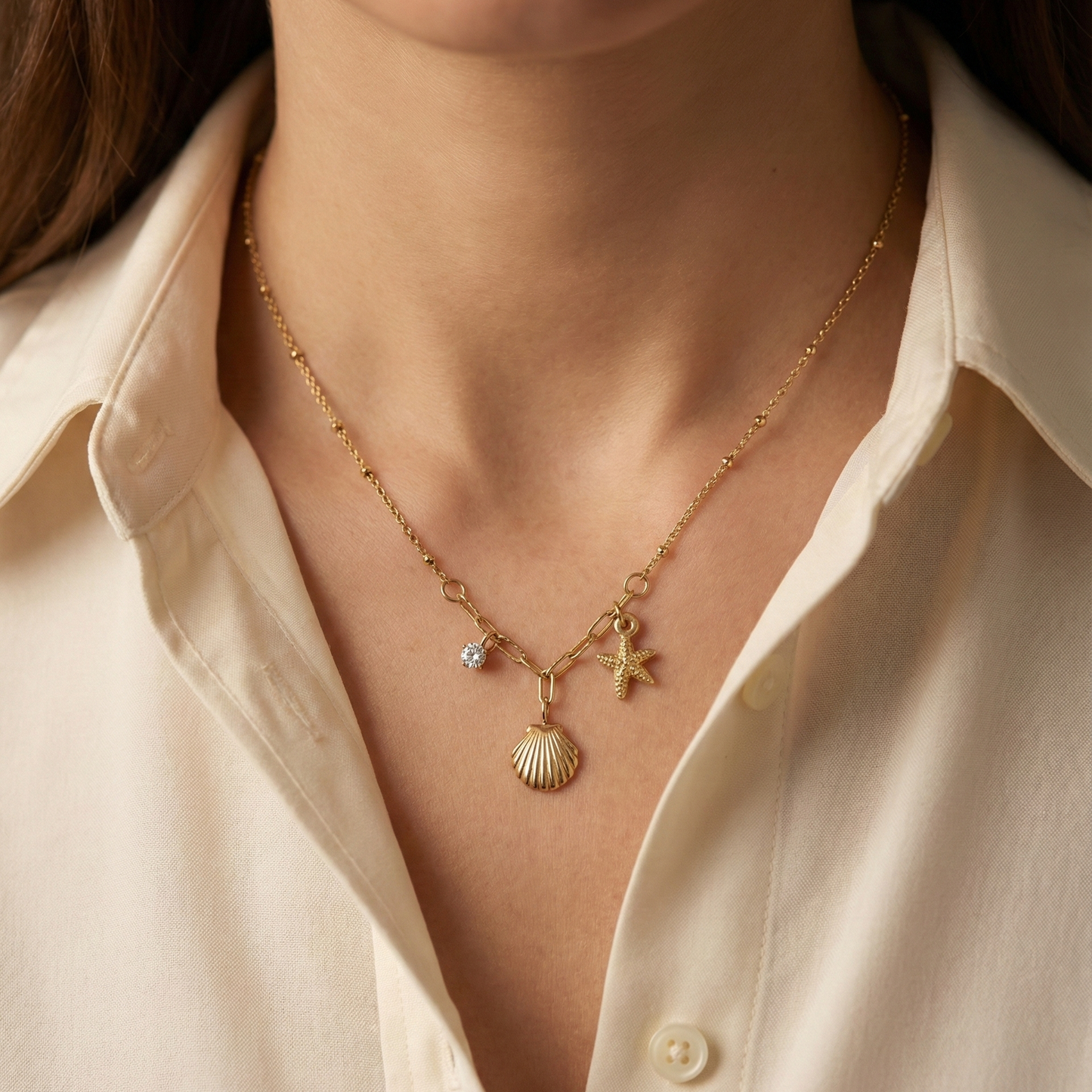 Collier coquillage et étoile en acier inoxydable doré