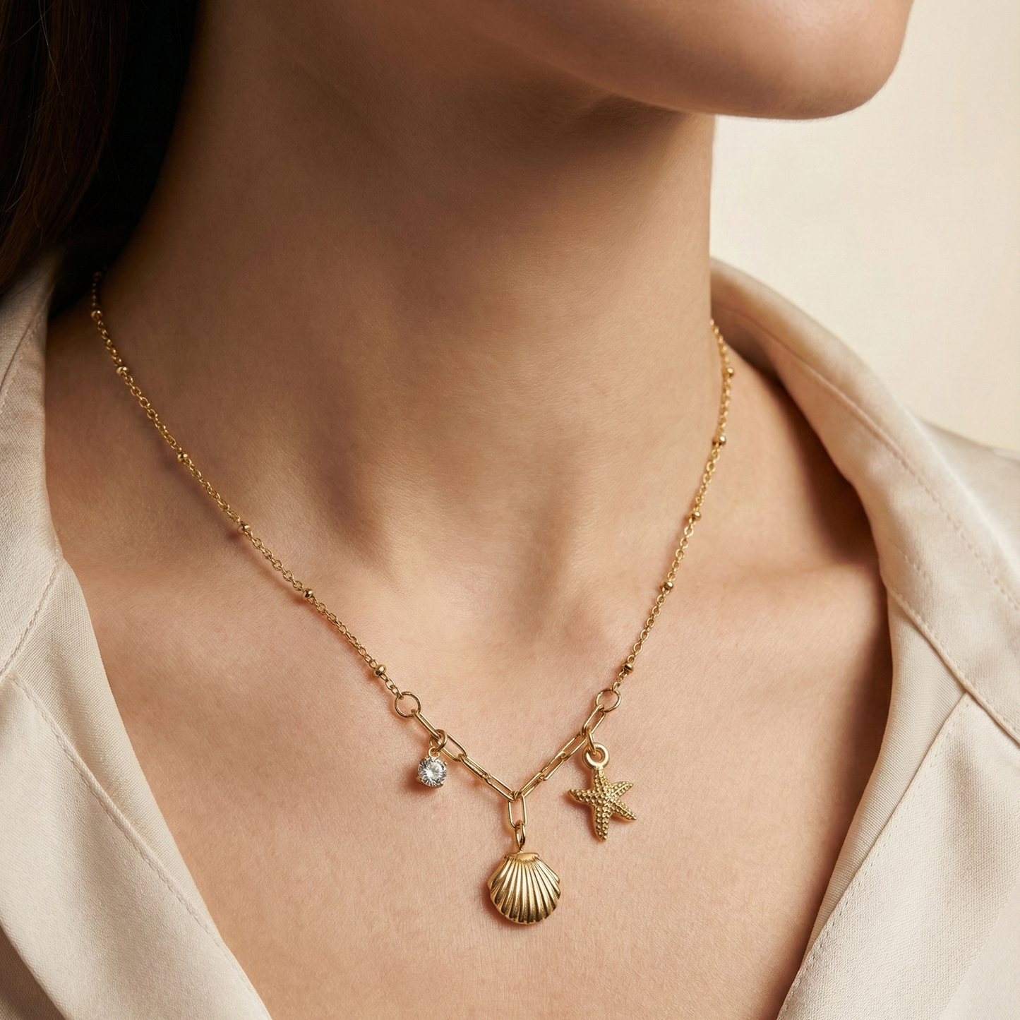 Collier coquillage et étoile en acier inoxydable doré