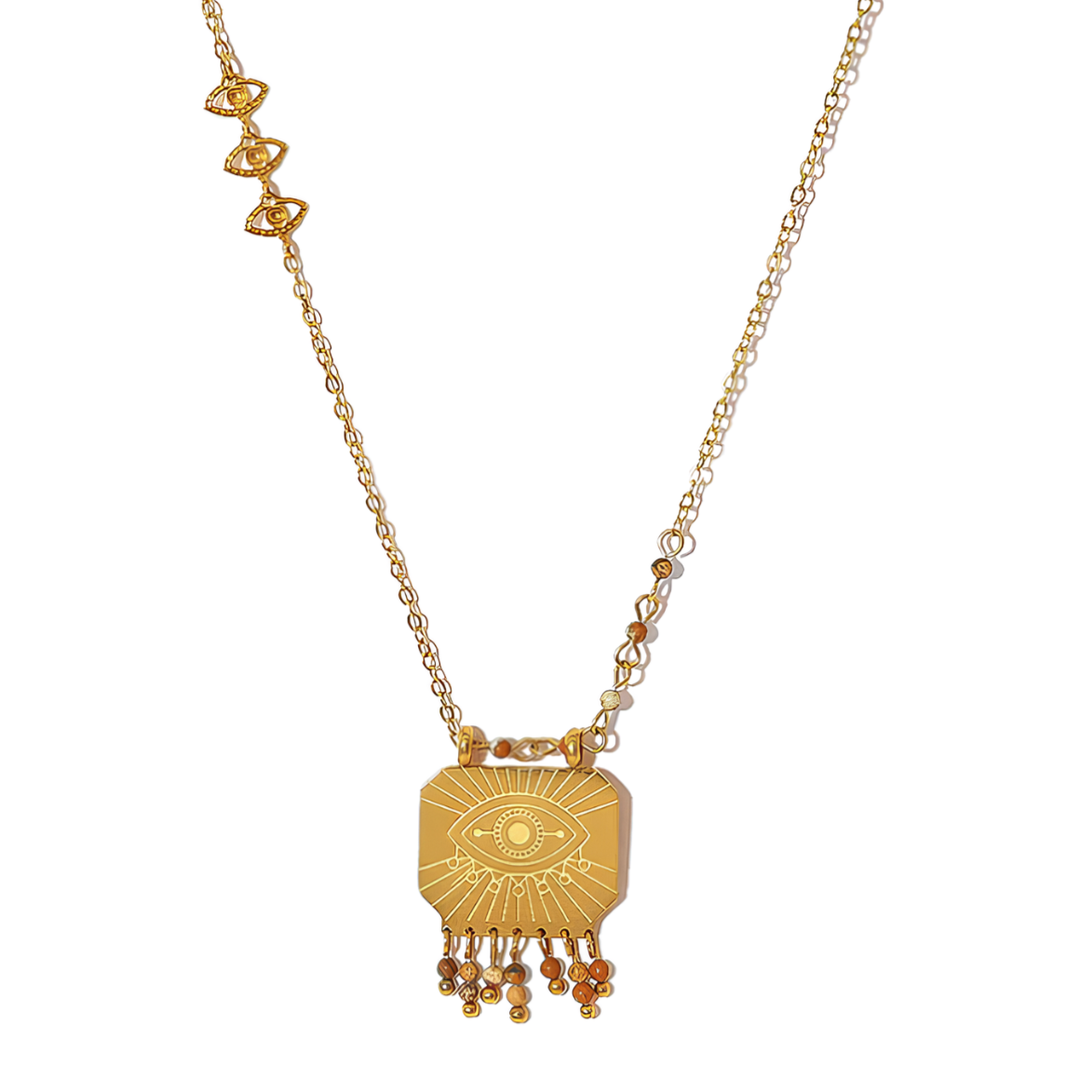 Un collier mystique et affirmé, où l’œil protecteur gravé s’entoure de détails soignés : petites pampilles en bas du pendentif et maillons décoratifs sur la chaîne. Une pièce symbolique à l’esprit bohème-chic.

Matériau : Acier inoxydable couleur doré, gravure précise, pampilles mobiles, résistant à l’eau et hypoallergénique.

Dimensions : Longueur chaîne standard avec maillons décoratifs sur le côté, pendentif carré légèrement bombé avec pampilles.

Design : Motif œil protecteur central, entouré de rayons 