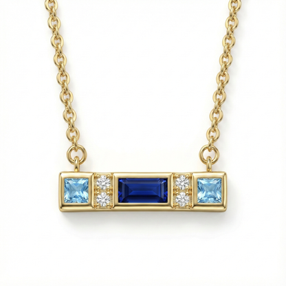 Collier doré à l’or 18k avec pendentif barre et pierres bleues