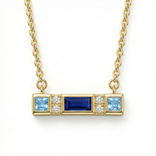 Collier doré à l’or 18k avec pendentif barre et pierres bleues
