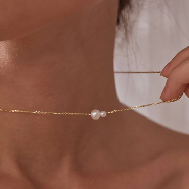 Collier duo de perles asymétriques en acier inoxydable couleur doré