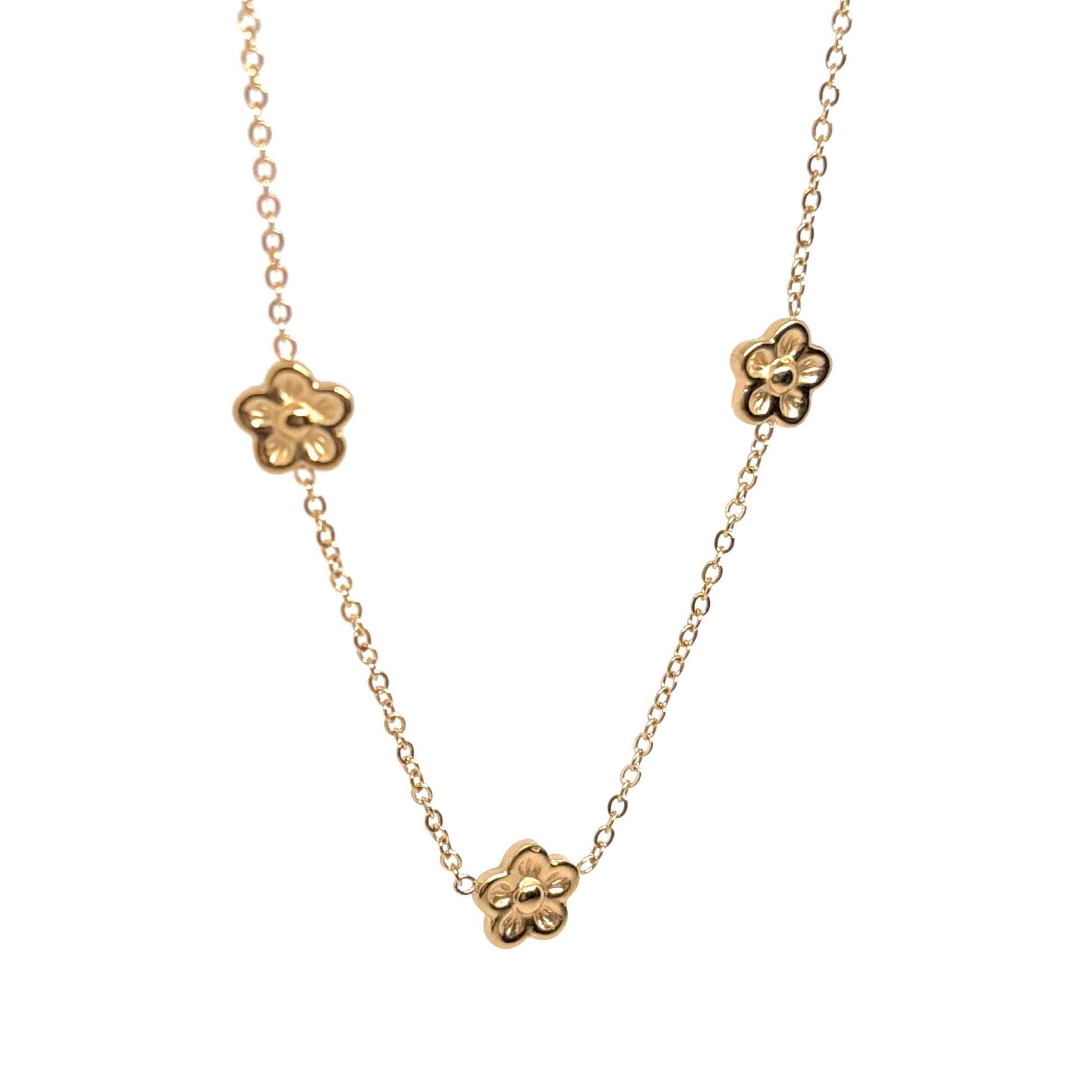 collier femme en acier inoxydable doré composé de trois fleurs miniatures en relief sur une chaîne fine, longueur 40 +5 cm, bijou floral délicat et bohème pour un look romantique et estival