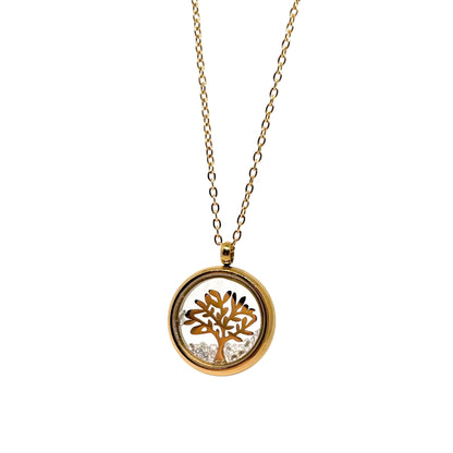 Collier doré pour femme en acier inoxydable avec médaillon rond transparent renfermant un arbre de vie doré et des éclats de cristal. Bijou lumineux et spirituel, résistant à l’eau et hypoallergénique, symbole d’harmonie et de croissance intérieure
