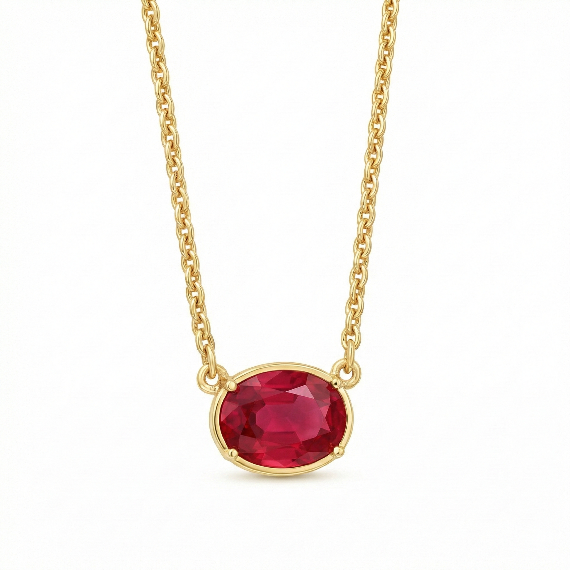 Collier fin doré or 18k avec pierre rouge ovale facettée sur chaîne torsadée