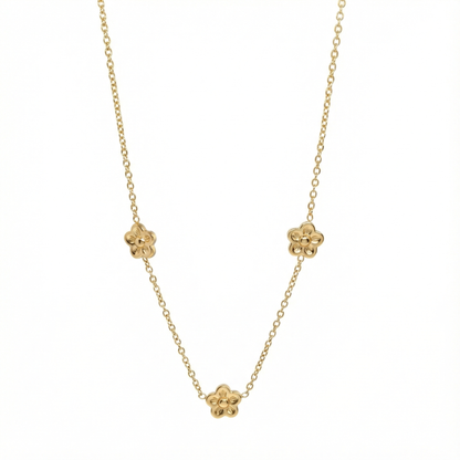 Collier trois fleurs miniatures en acier inoxydable couleur doré