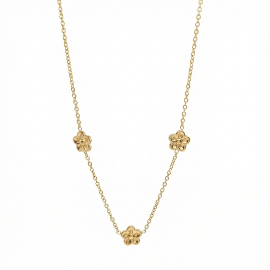 Collier trois fleurs miniatures en acier inoxydable couleur doré