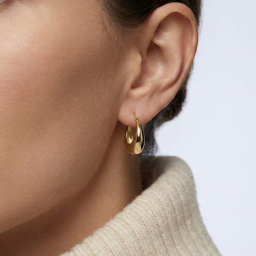 Créoles bombées dorées or 18k à finition miroir brillante, design compact et minimaliste chic