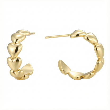 Créoles doré à l’or 18k avec cœurs sculptés en relief