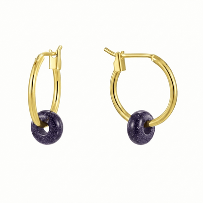 Créoles dorées 18K en laiton avec pendentif violet pailleté effet sable doré