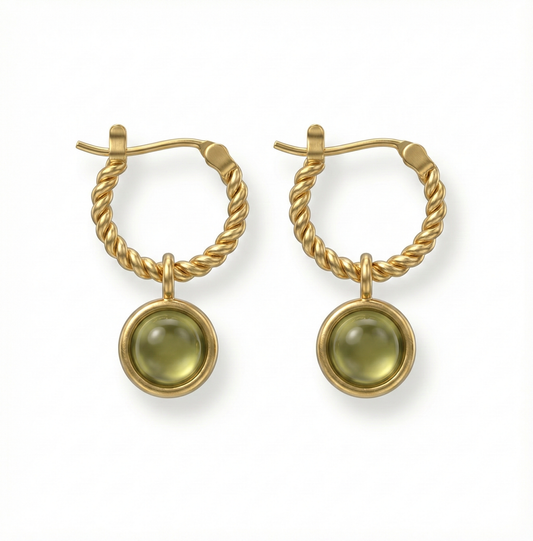 Créoles torsadées en acier inoxydable doré avec pierre verte