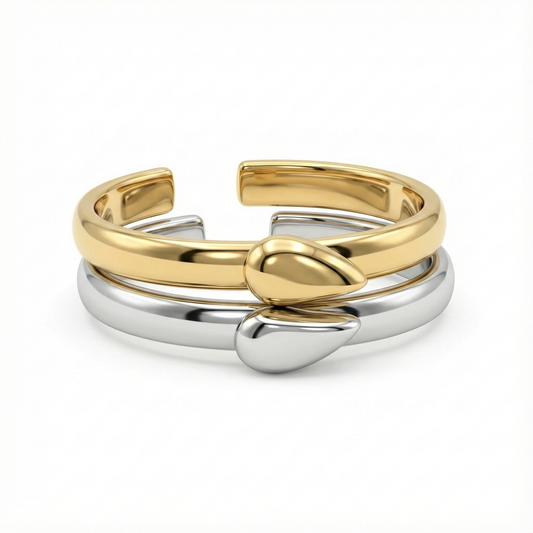 Détail design duo cœur acier inoxydable doré et argent